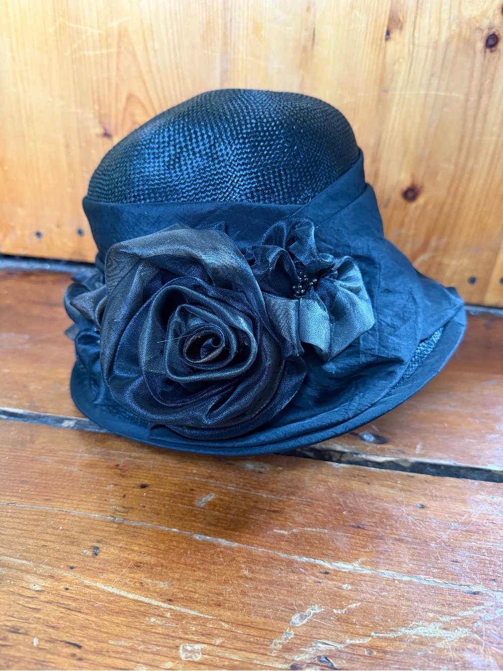 Chic Black Floral Cloche Hat with Rosette Accent